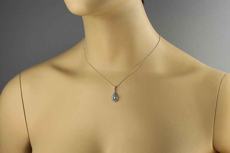 Изображение Золотая подвеска с топазом и цирконами