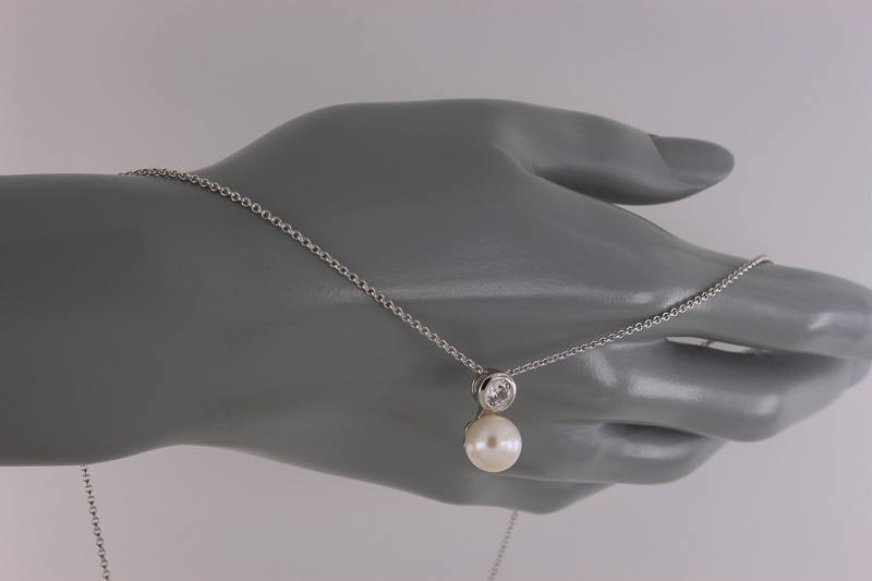 Изображение Серебряная цепочка с жемчугом и цирконом 42-49 см